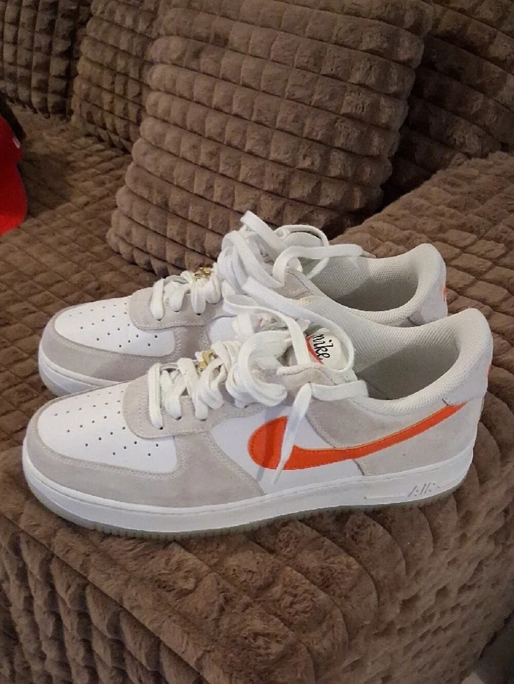 Nike White and Beige Low-Top Sneakers with Black Swoosh
